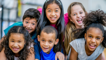 A group of children smiling