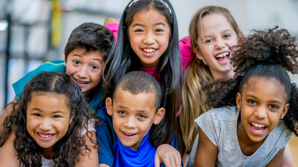 A group of children smiling