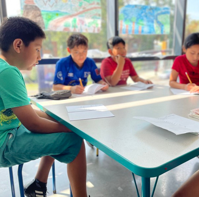 Students working at a table