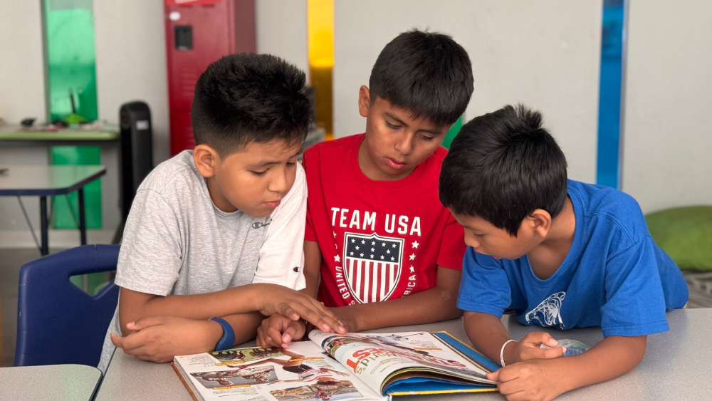 Three students reading