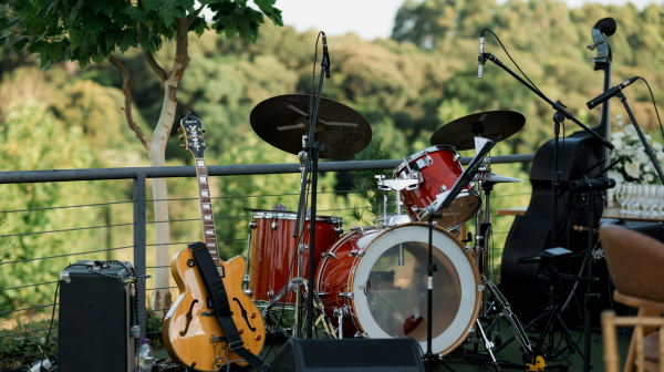 Photo of music equipment on a stage outside