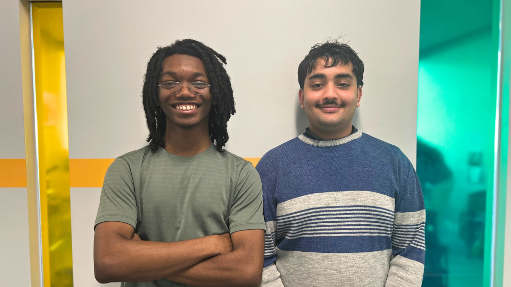A photo of Aspire's two Youth Development Apprentices