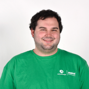 A man in a green Aspire AmeriCorps t-shirt